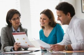 Couple inspecting mortgage