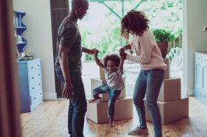 young family moving into their house